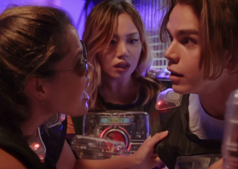 a video depicting a group of friends playing laser tag at Timezone