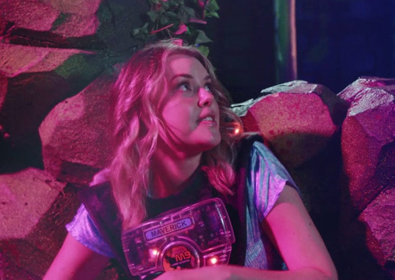 a video depicting a group of friends playing laser tag at Timezone